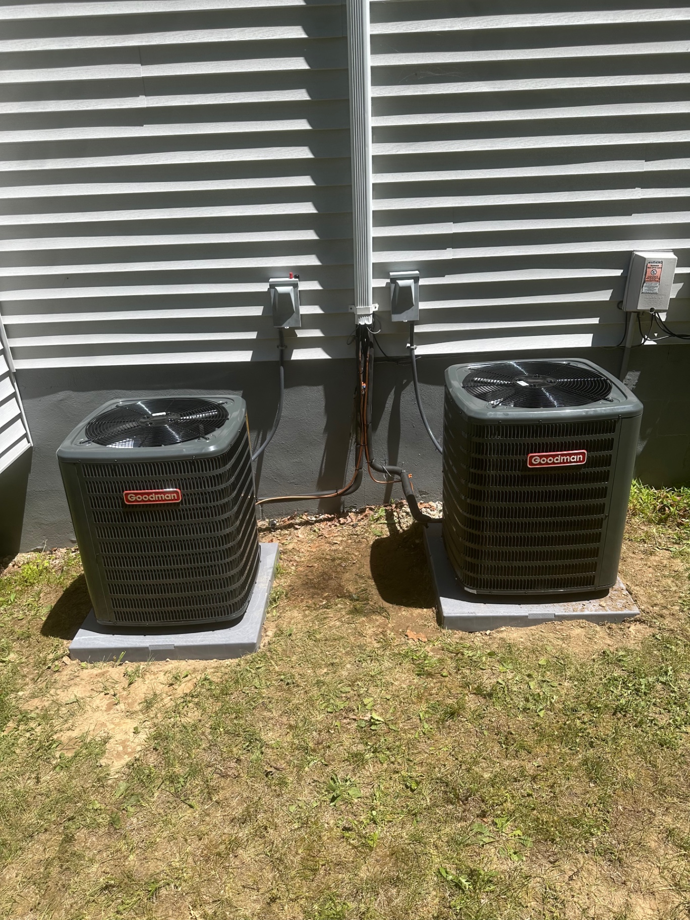 Dual central AC condensers installed side by side